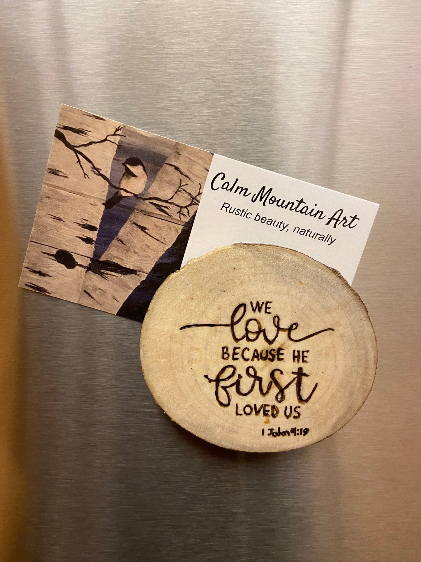 Wood Slice Magnet - “We Love Because He First Loved Us”